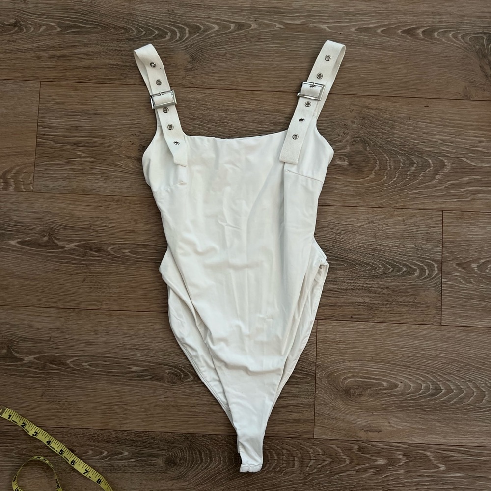 White buckle bodysuit
